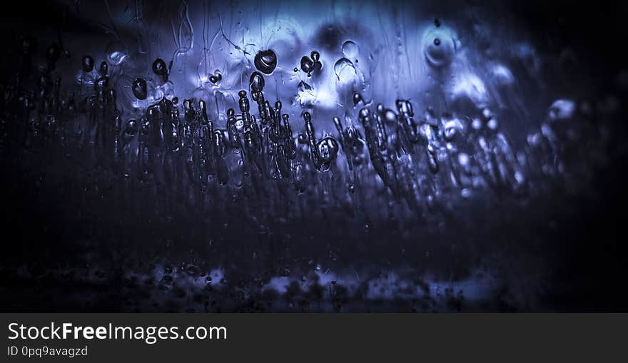 Bubbles of air frozen inside the ice close up