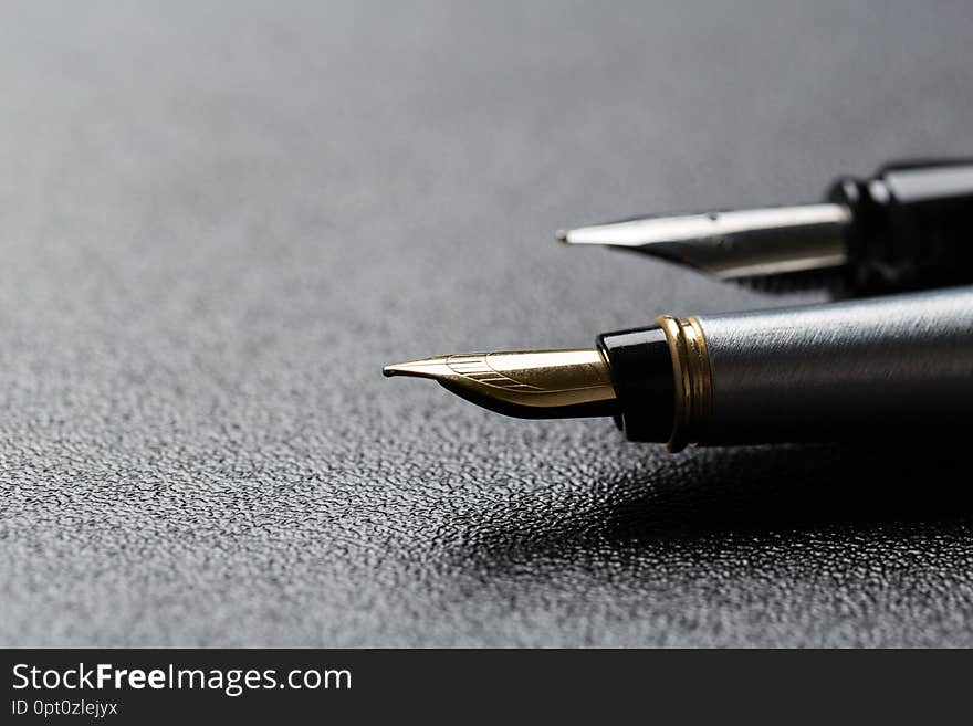 Fountain pen with clipping path on black background