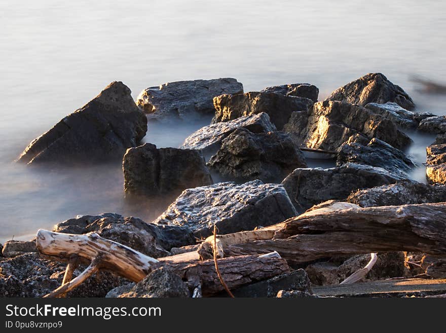 Long Exposure Of The Lake Ontario Shoreline Rocks