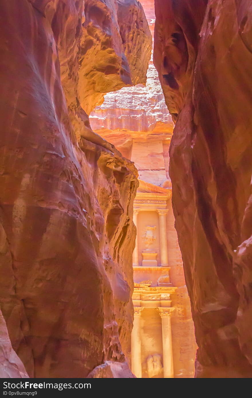 Breathtaking `Al-Khazneh` : the Treasury as it reveals in its full glory to the walkers in canyon `al-Siq`. Petra