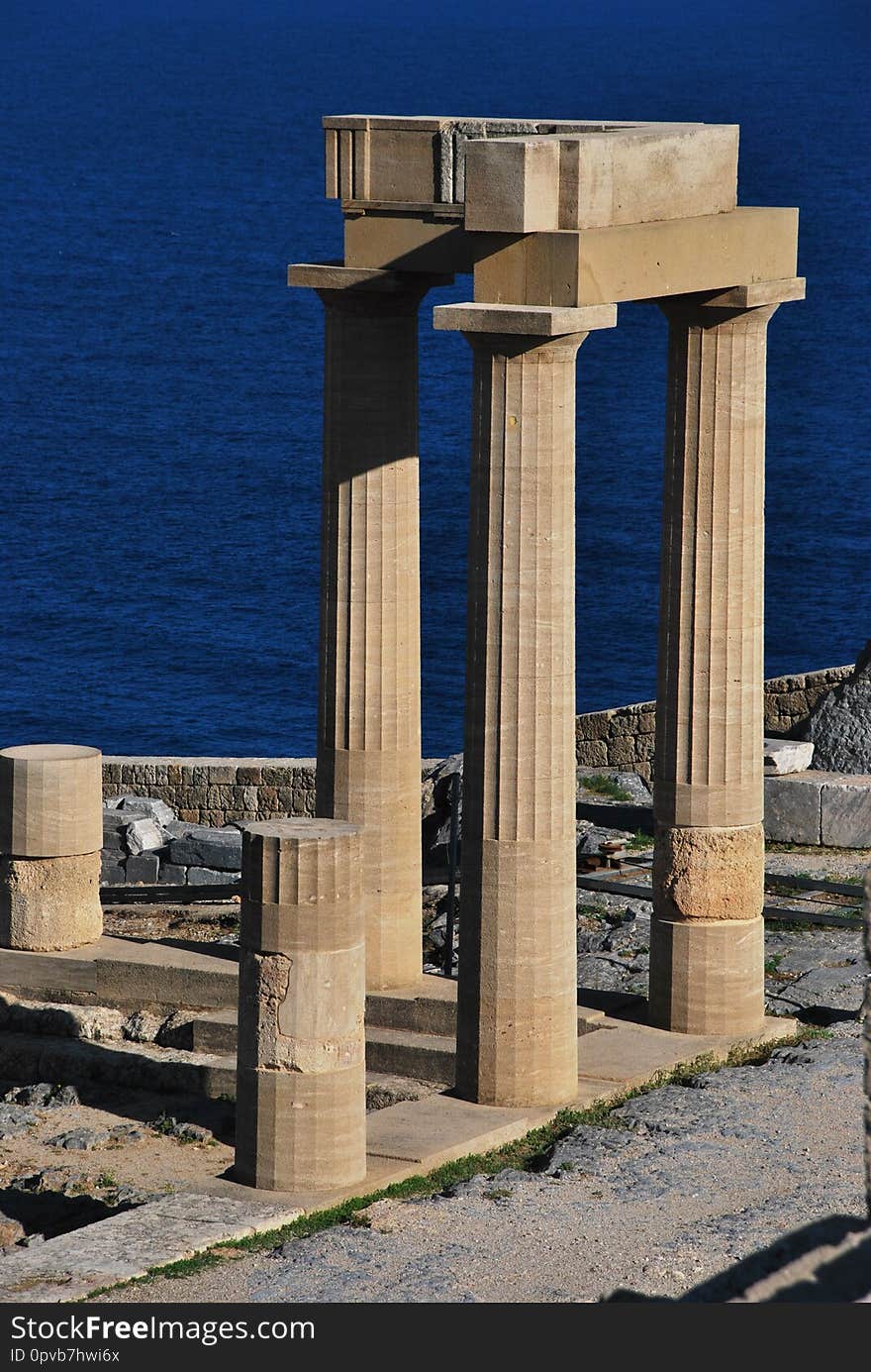 Pillars of a Temple in the Acropolis of Lindos in Rhodes Island, Greece