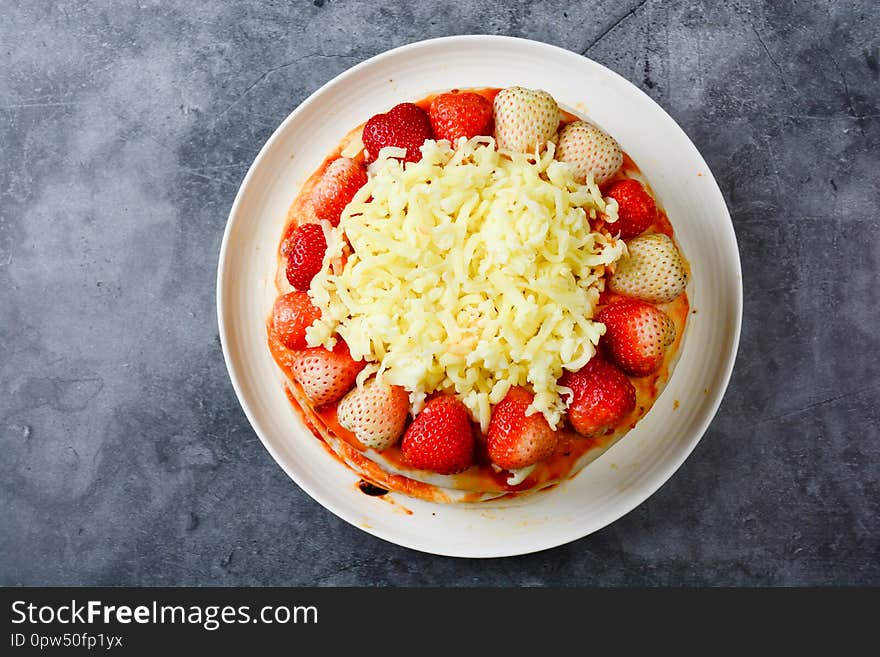 Pizza with strawberry and cheeses, sweet pizza, layer cake pizza pn white background