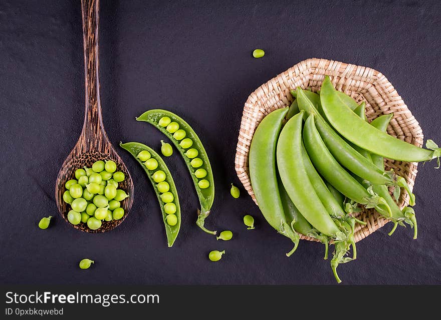 Sugar Snap Peas With Mint On A Rustic Wood Background