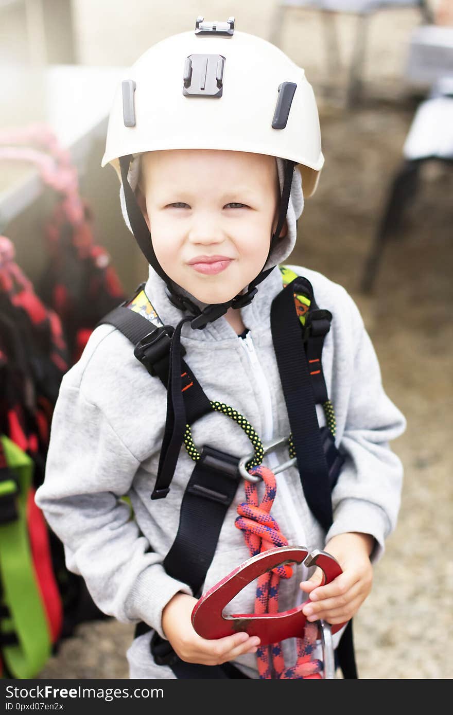 Boy in a climbing helmet