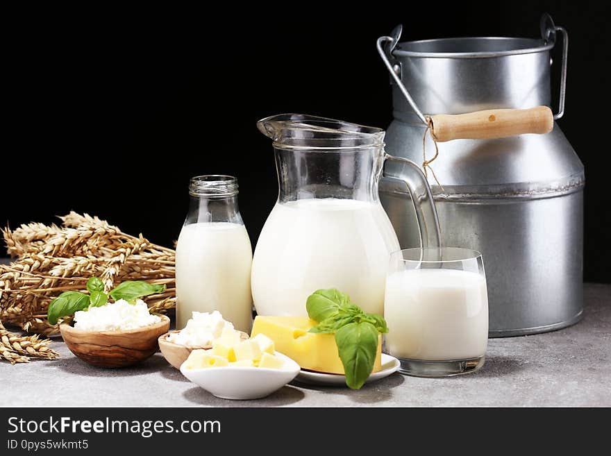 Milk products. tasty healthy dairy products on a table and milk jar, glass bottle and cheese. Milk products. tasty healthy dairy products on a table and milk jar, glass bottle and cheese