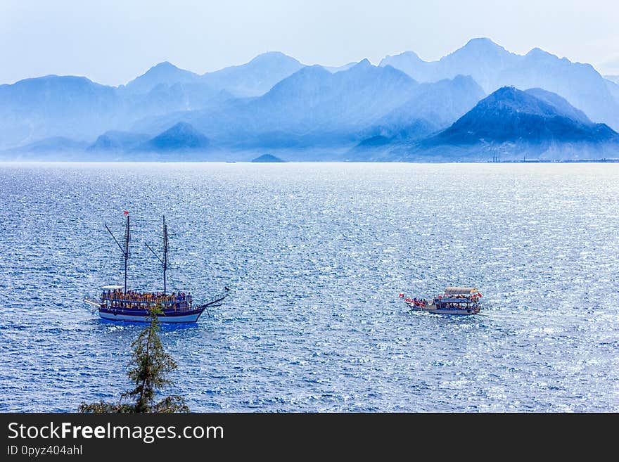 Mediterranean landscape in Antalya. View of the mountains, sea, yachts and the city