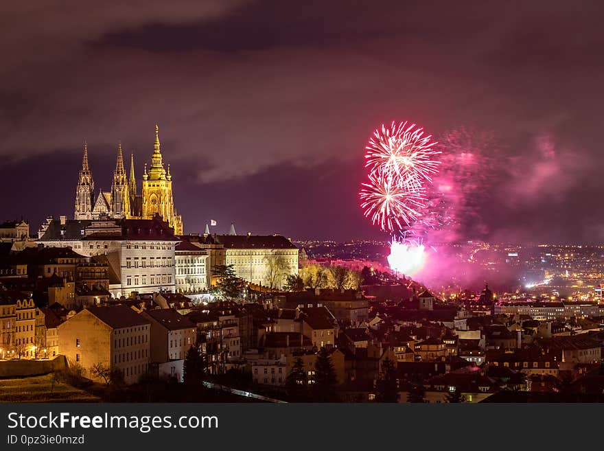 Fireworks over the Old Town of Prague, Czech Republic. New Year fireworks in Prague, Czechia. Prague fireworks during New Year