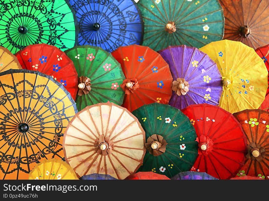 Handmade umbrellas made in a manufactory in Myanmar. Handmade umbrellas made in a manufactory in Myanmar