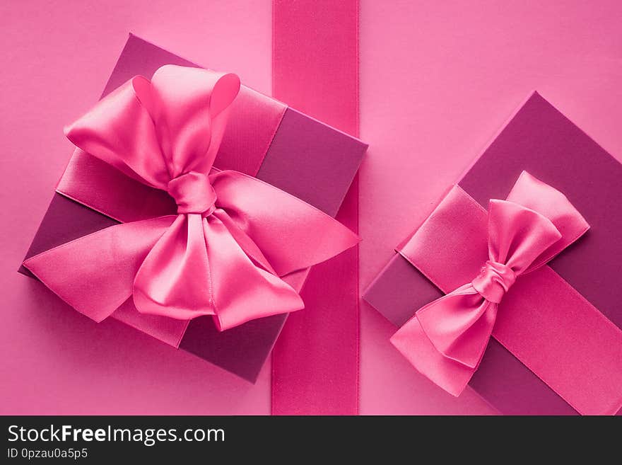 Baby shower girl, celebration, present concept - Pink gift boxes, feminine style flatlay background