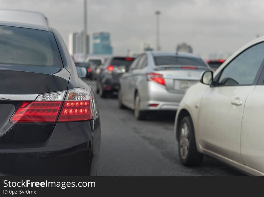 traffic jam on main street with row of cars in downtown, central businees distric