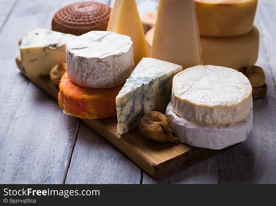 Cheese platter with blue, aged, yellow and white cheeses. Cheese platter with blue, aged, yellow and white cheeses