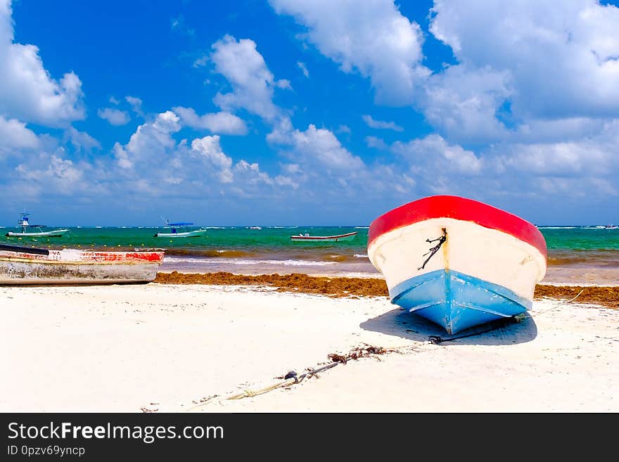 Colorful Fishing Boats At The Beach In Tulum In Mexico