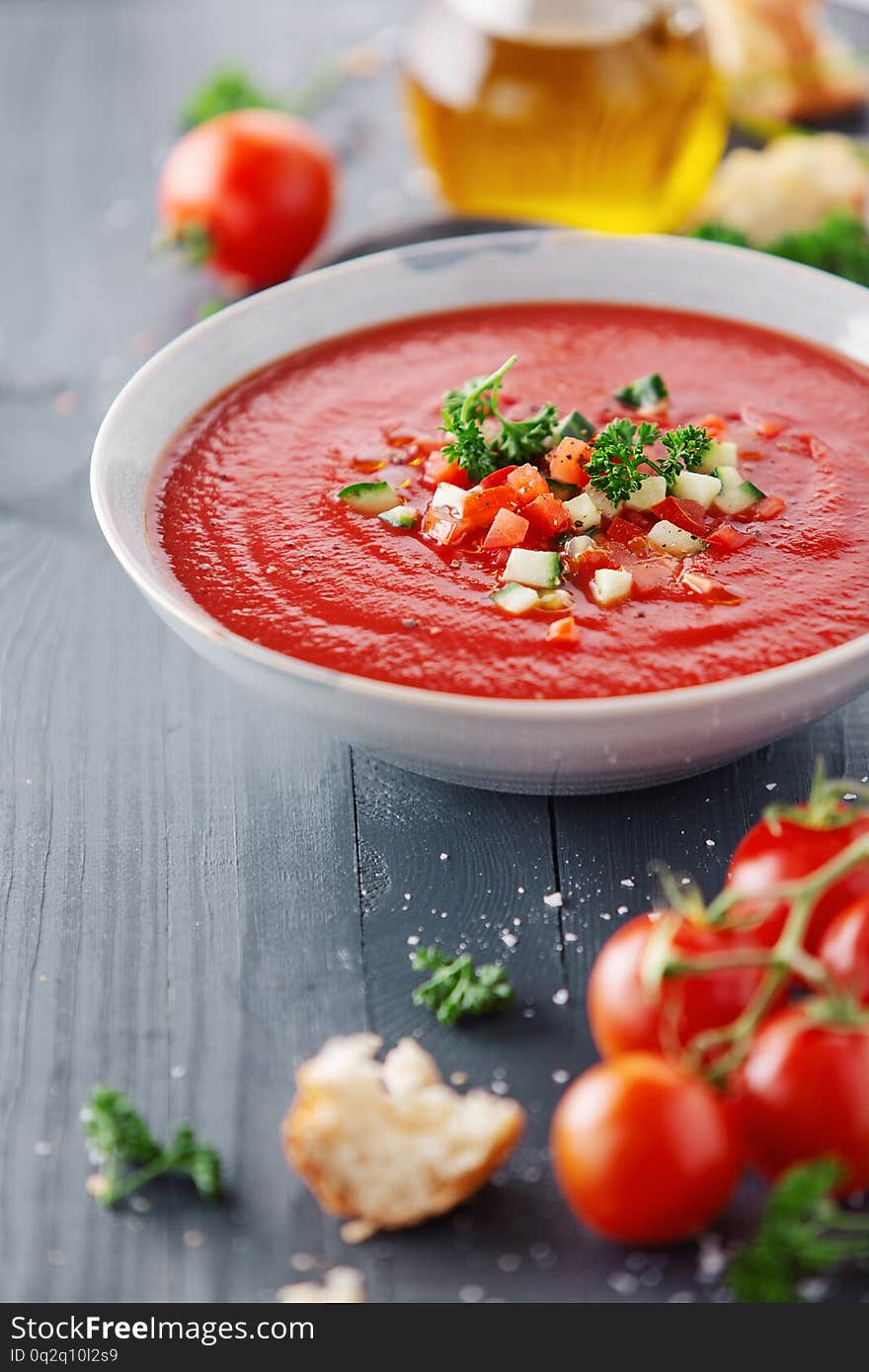 Tasty summer tomato soup served in bowl