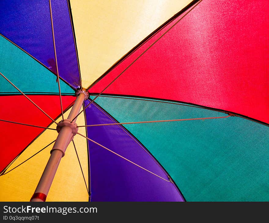 Abstract background. Colorful umbrella with sunshine