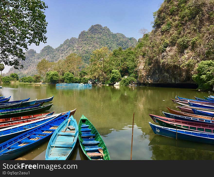 Colorful Boats in a green lake in Myanmar Burma