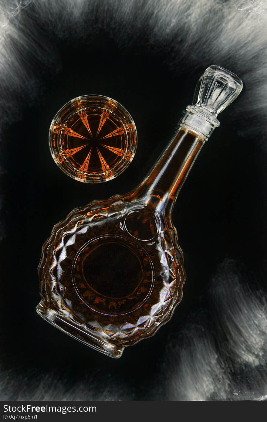 Glass Of Whiskey Or Brandy Or Cognac With Carafe On Isolated Black Background, Top View