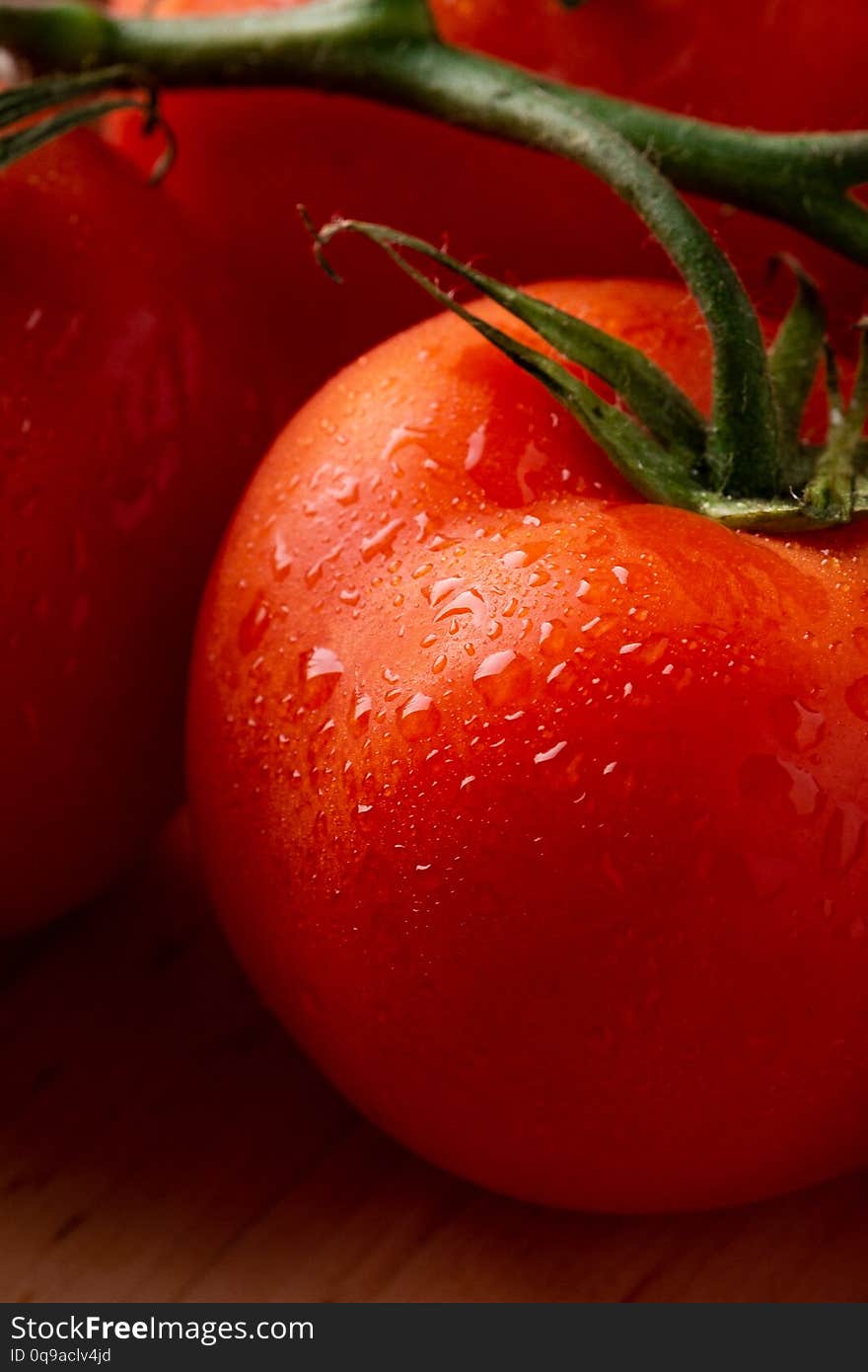 Tomato Vegetables On Wooden Plate Close Up