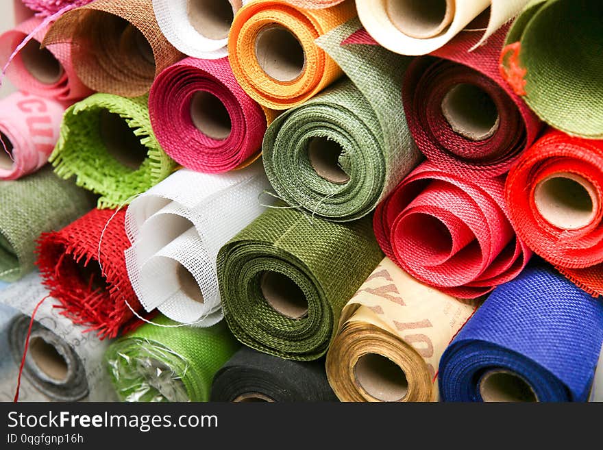 Background of rolls of material for flower bouquets