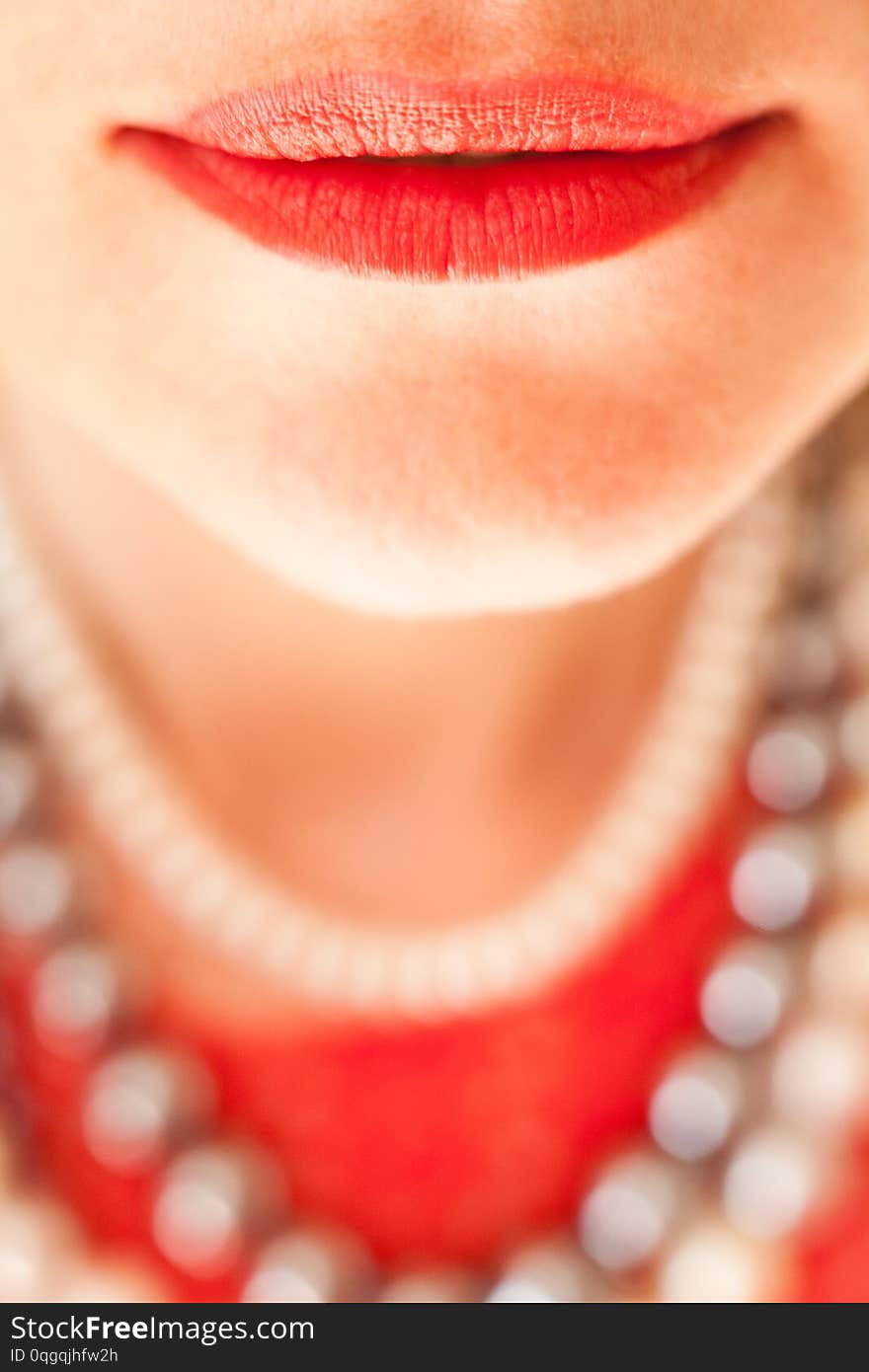 Red lips of the beautiful woman. Close up. Red lips of the beautiful woman. Close up