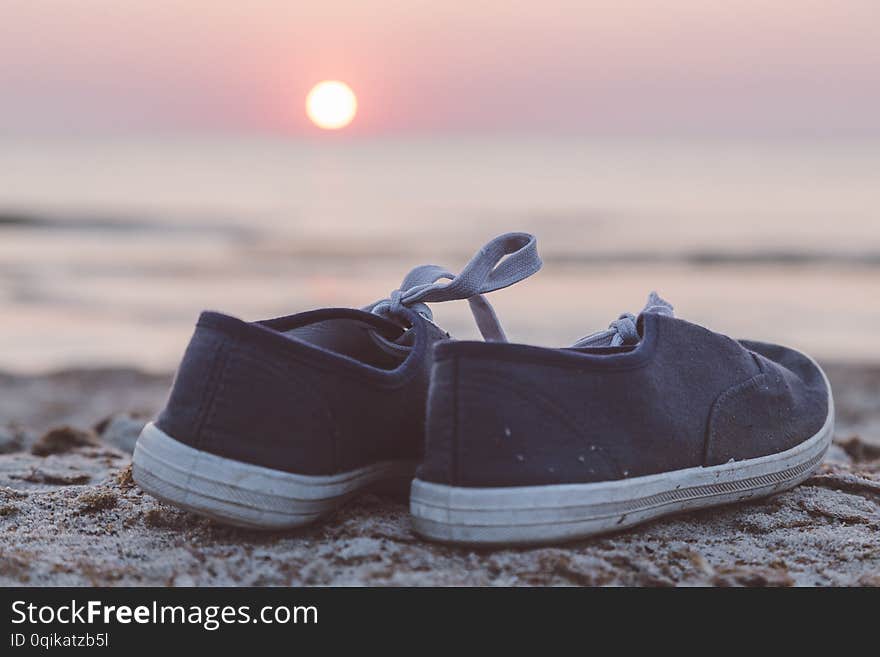 Two Sneakers At The Beach