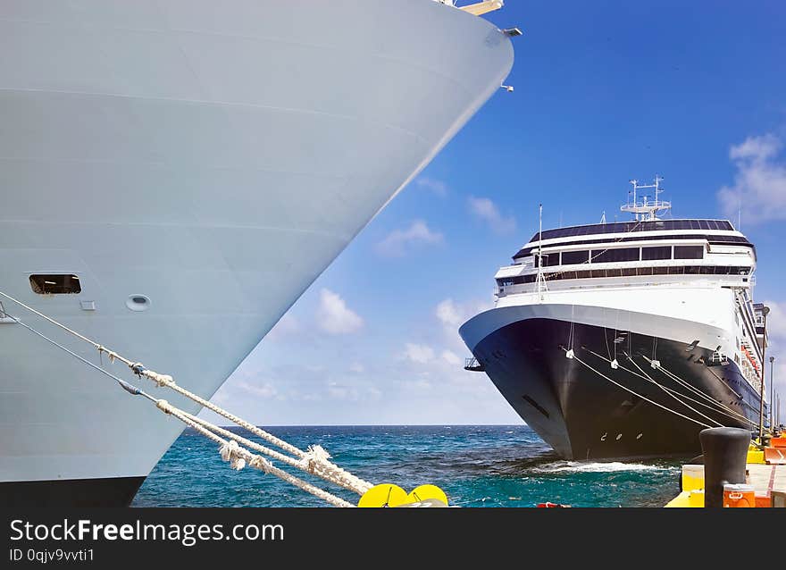 e view of cruise ships on the blue sky background. e view of cruise ships on the blue sky background