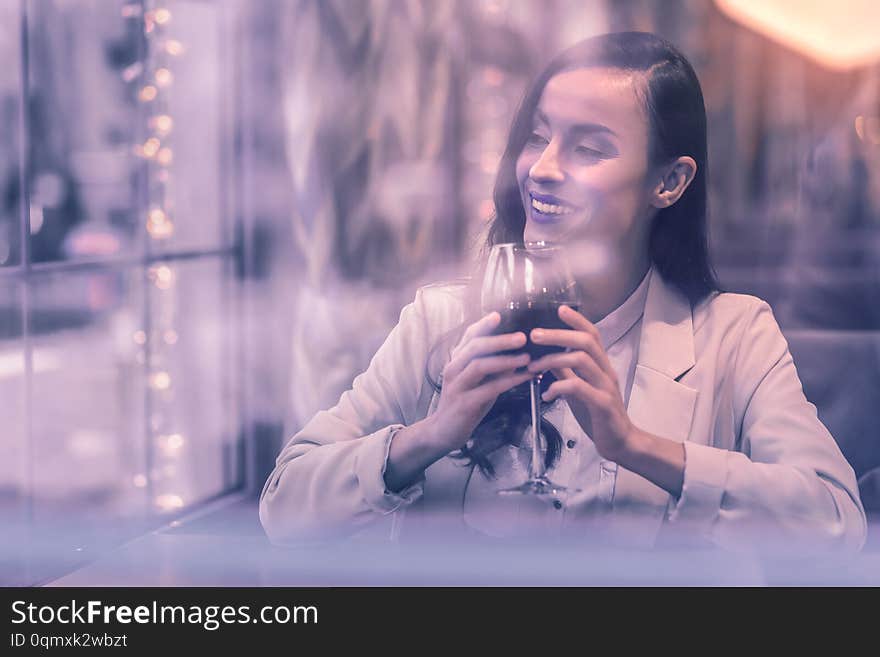 Positive Joyful Woman Looking Into The Window