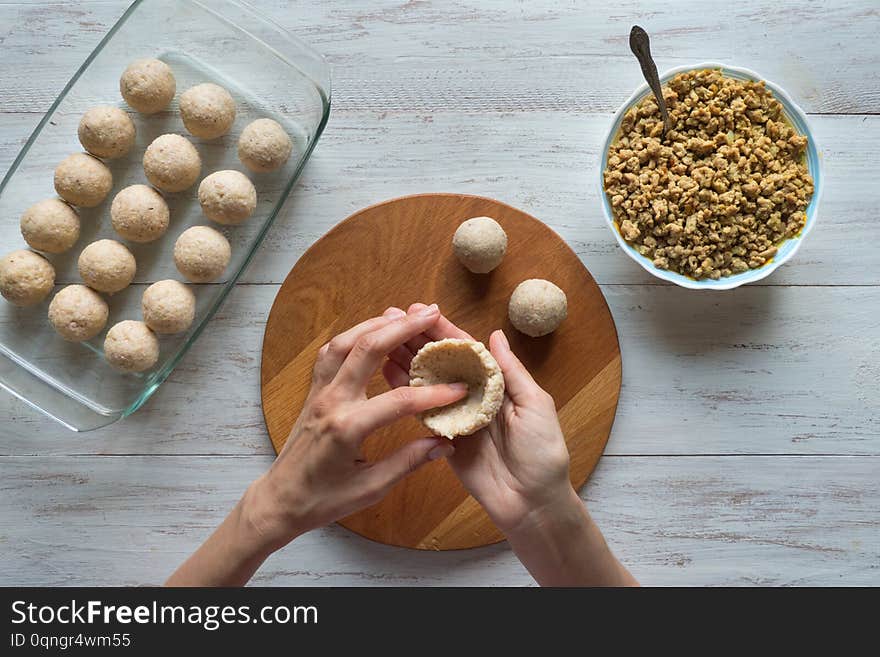 Cooking of Arabic meat appetizer Kibbeh. Traditional Arabic kibbeh with lamb and pine nuts.