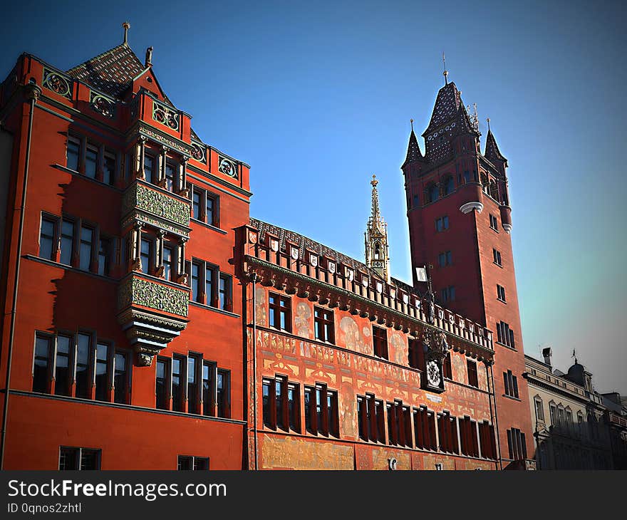 Impressive building of a medieval town hall.It is located in the city center, notice a tiled roof, old statues, inside and a big tower on it. Impressive building of a medieval town hall.It is located in the city center, notice a tiled roof, old statues, inside and a big tower on it.