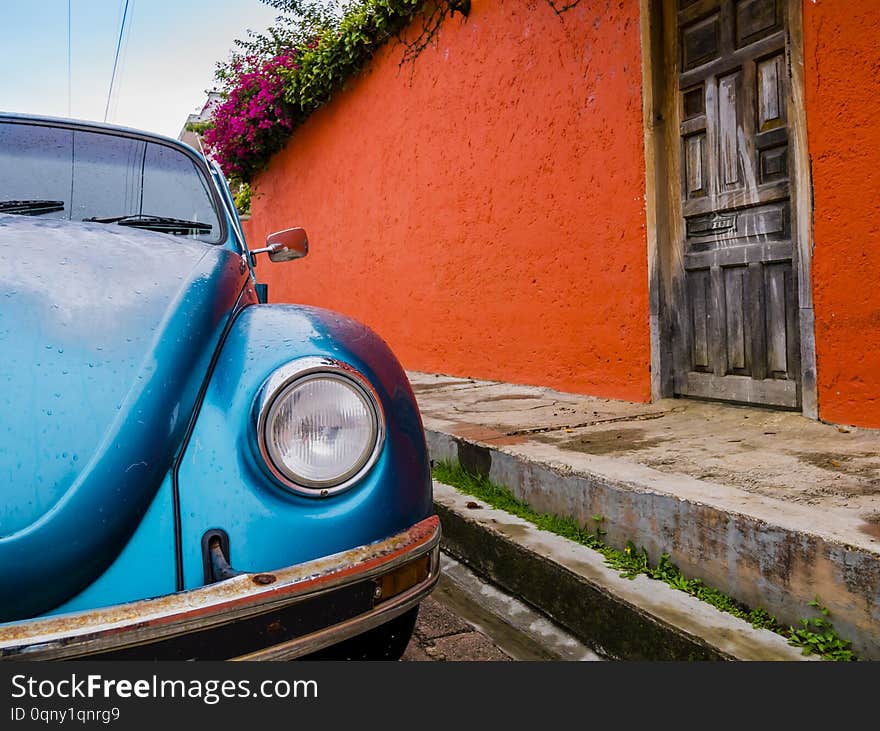 Classic car parked in the colorful colonial streets of San Cristobal de las Casas, Chiapas, Mexico