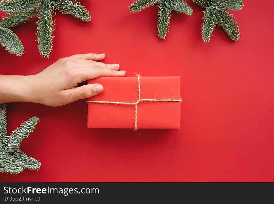 Christmas composition.  Background with gift box and decorations.