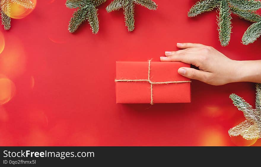 Christmas composition.  Background with gift box and decorations.