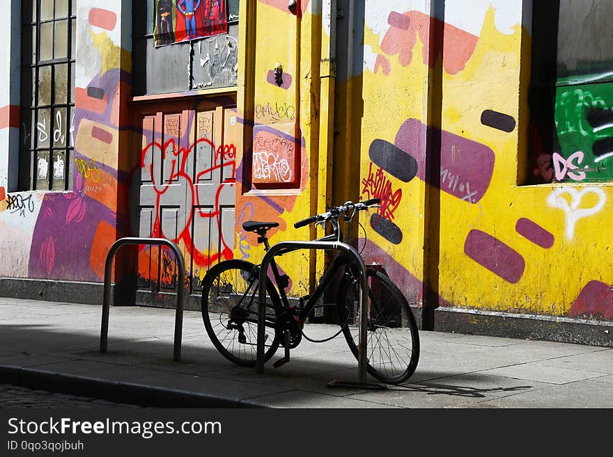 Bicycle on a coloured wall in Dublin