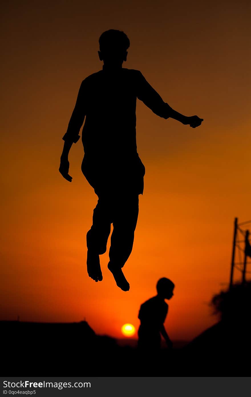 Boys jumping on a trampoline