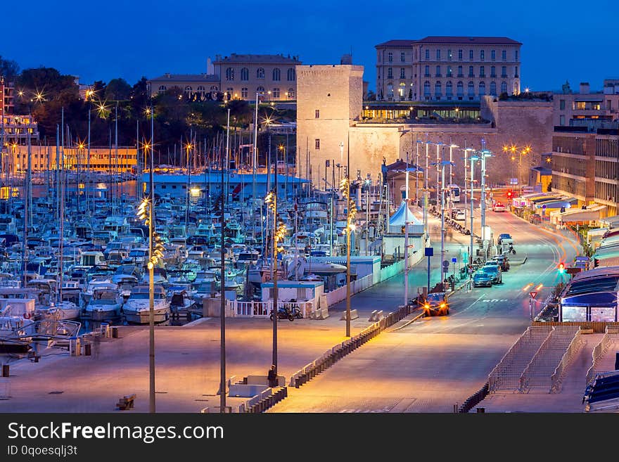 Marseilles. View Of The Old Port And The City Embankment At Sunset.