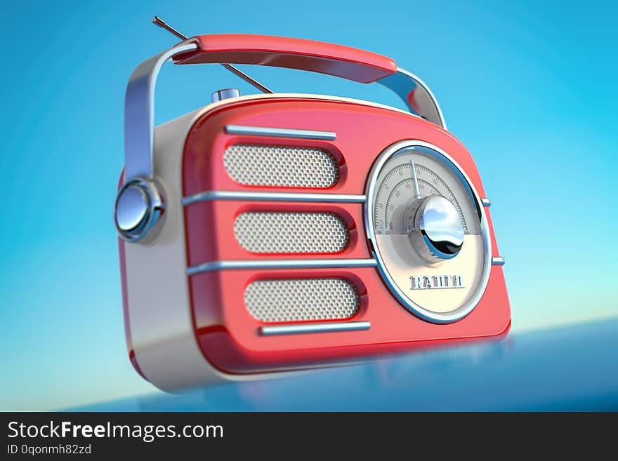 Red vintage retro style radio receiver on the sky background