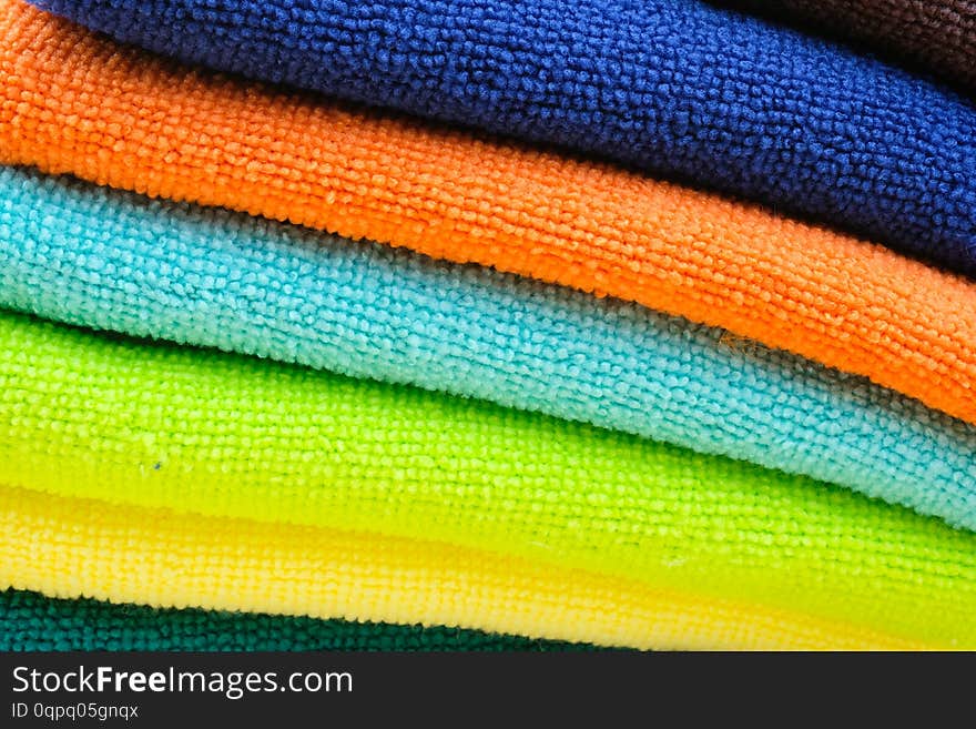 Stack of multicolored bath towels