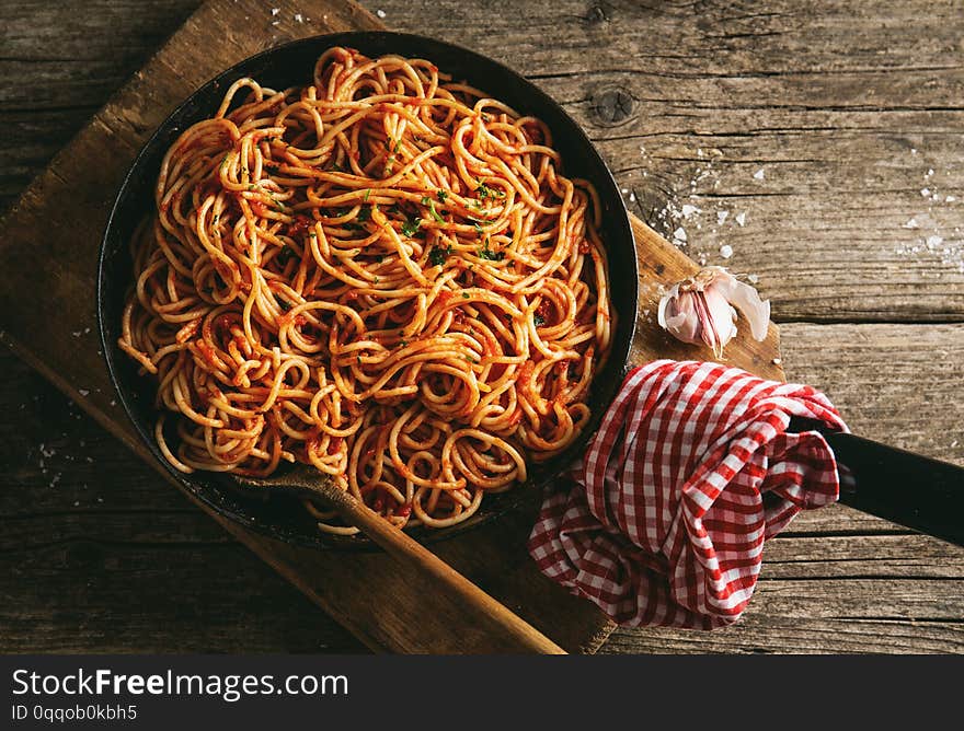 Italian spaghetti with tomato sauce in pan