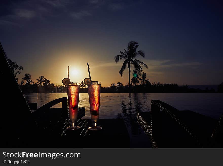 Fresh summer cold alcoholic drinks exotic cocktails on the rooftop pool in bali indonesia. Fresh summer cold alcoholic drinks exotic cocktails on the rooftop pool in bali indonesia