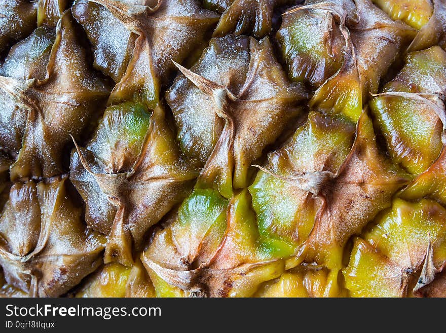 Close-up of pineapple skin texture abstract background. Close-up of pineapple skin texture abstract background