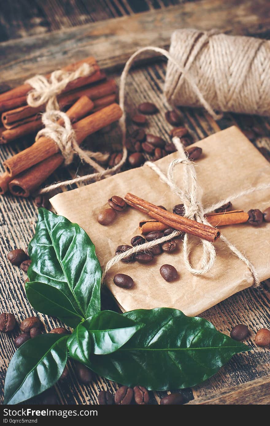 Roasted coffee beans on  old wooden  background