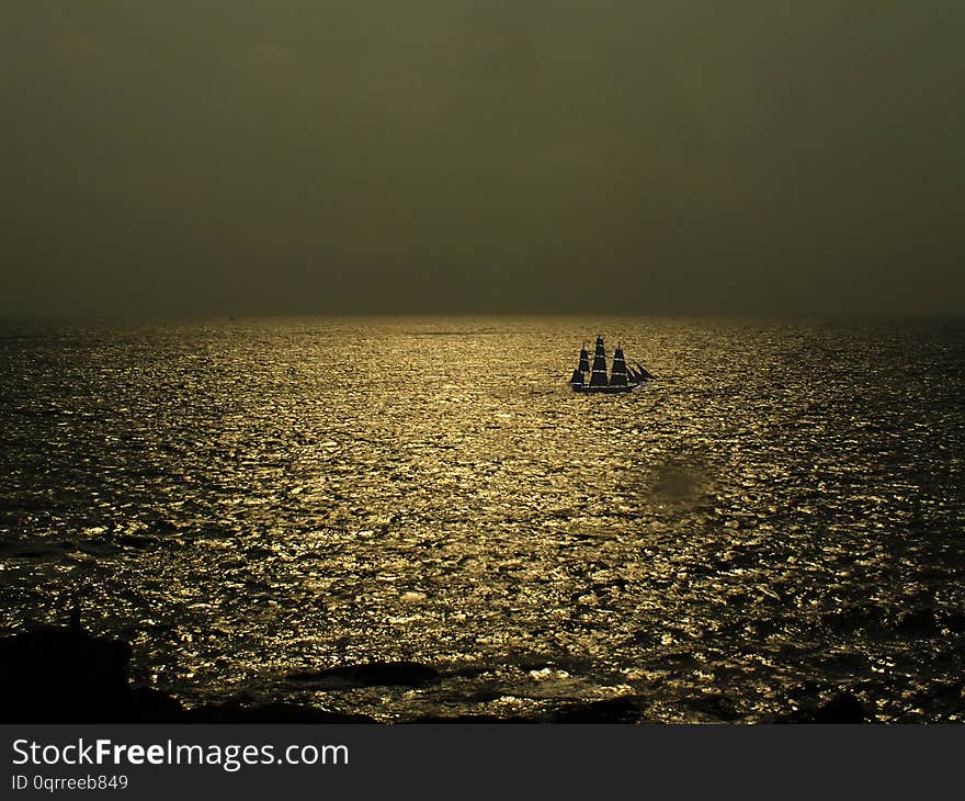 Golden Sea Water With Boat