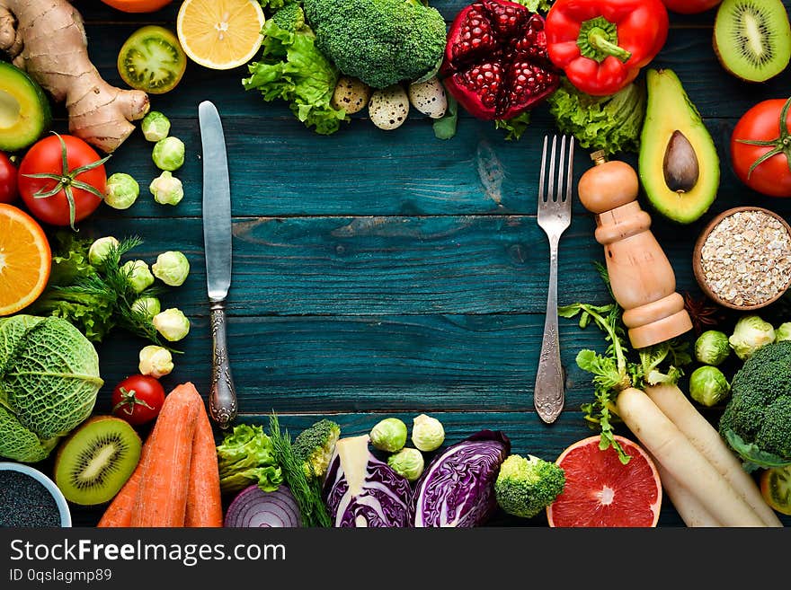 Healthy Organic Food On A Blue Wooden Background.