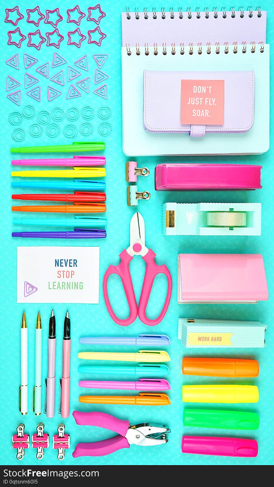 Back to school or workspace colorful stationery overhead flatlay.