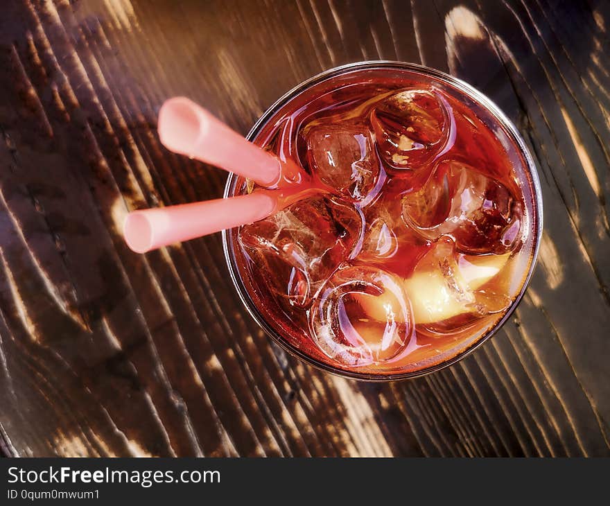 Negroni cocktail on top view with wooden background