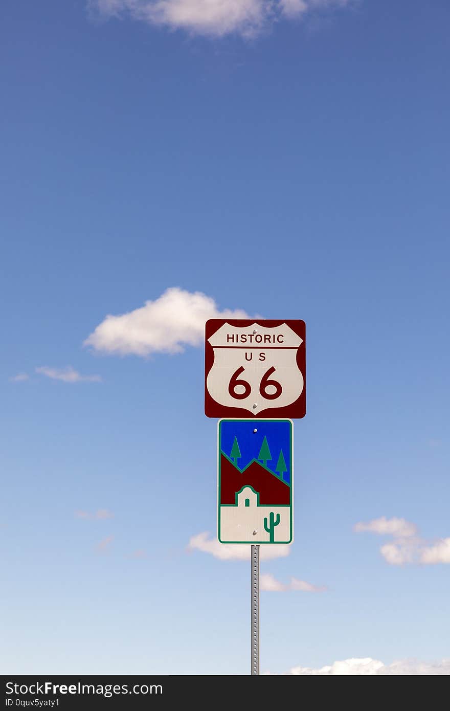 Route 66 sign under clear blue sky in Golden valley