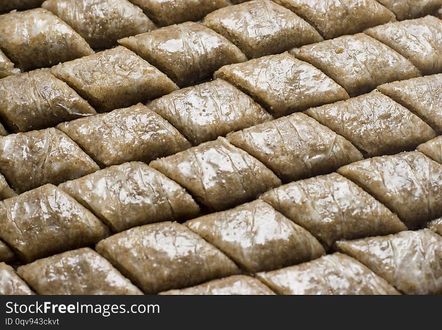 Pieces of Turkish or arabic traditional declious oriental dessert pahlava, baklava