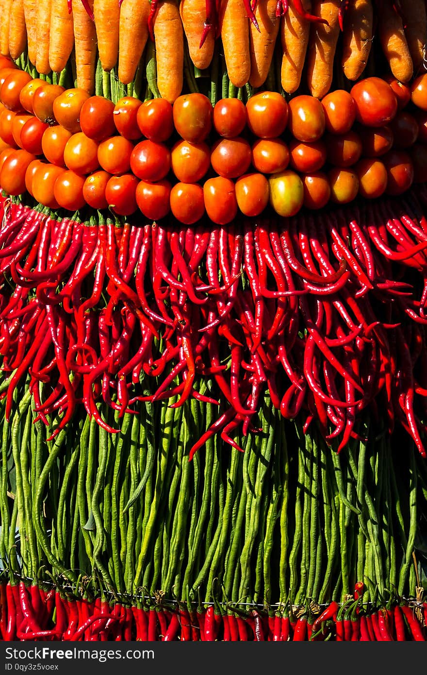 Colorful and variated crop harvest arranged for Gunungan Festival, a traditional event in Javanese culture of Indonesia. Colorful and variated crop harvest arranged for Gunungan Festival, a traditional event in Javanese culture of Indonesia