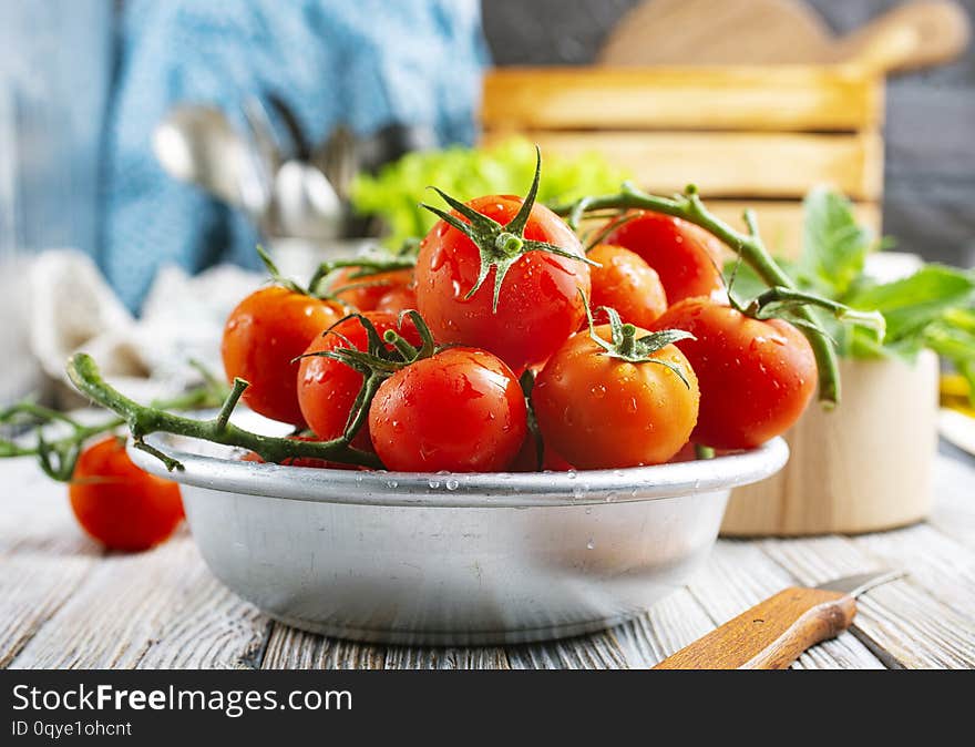 Fresh tomato in metal bowl, fresh tomato for salad