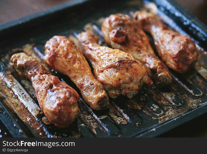 Food cooking. Fried chicken legs