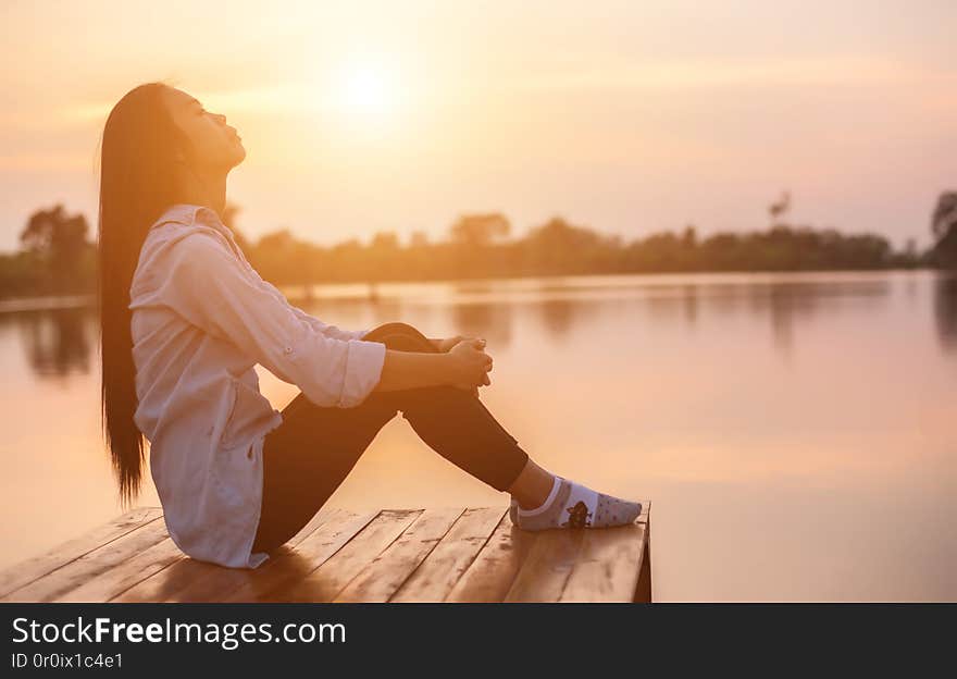 Lonely woman sad sunset background